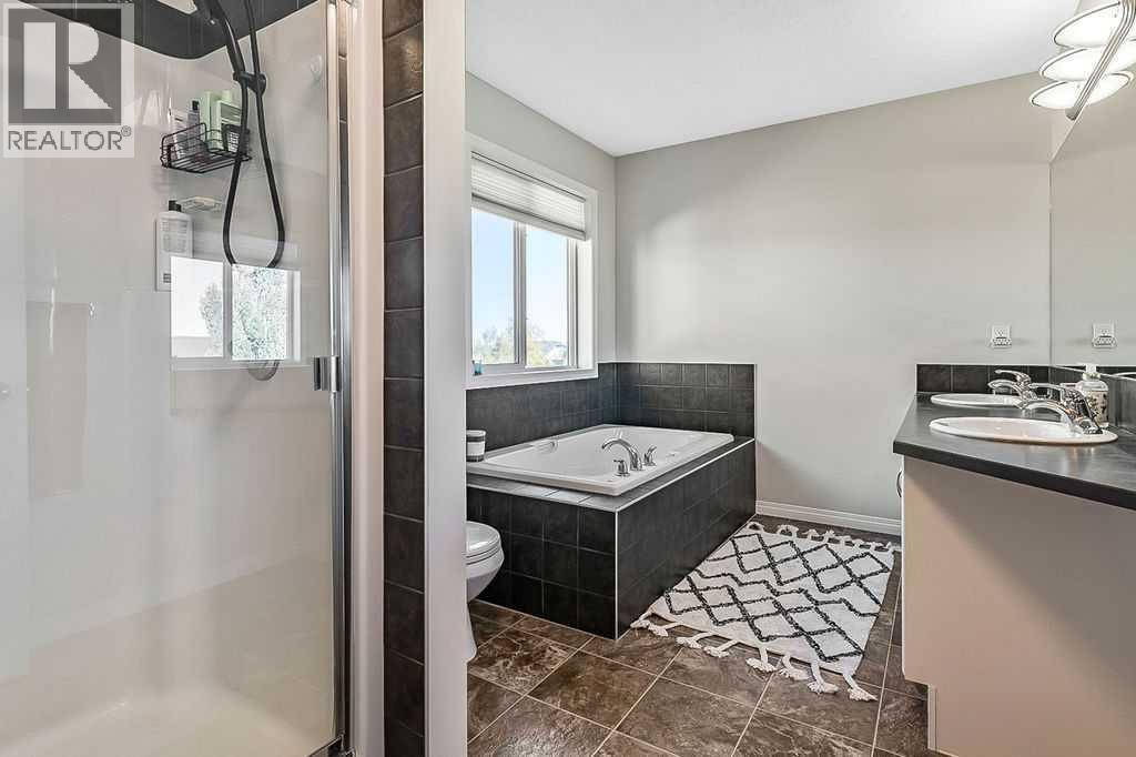 394 Cimarron Boulevard, Okotoks, Alberta  T1S 0A9 - Photo 17 - A2263407