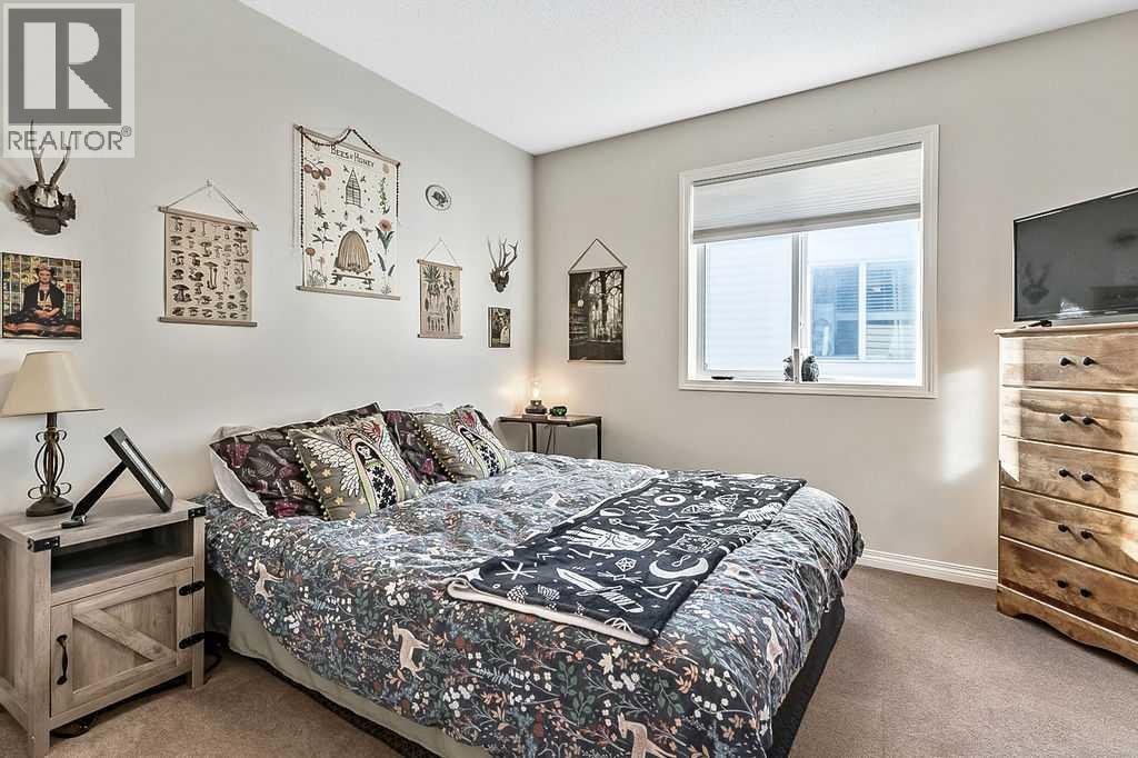 394 Cimarron Boulevard, Okotoks, Alberta  T1S 0A9 - Photo 18 - A2263407