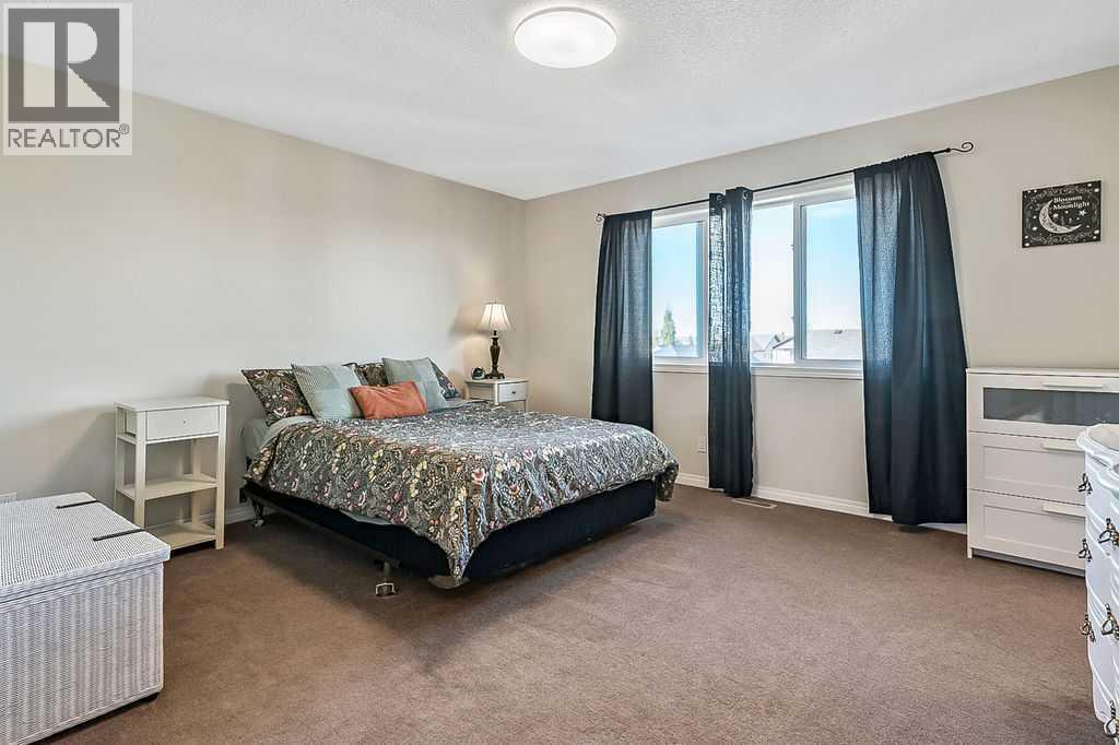 394 Cimarron Boulevard, Okotoks, Alberta  T1S 0A9 - Photo 16 - A2263407