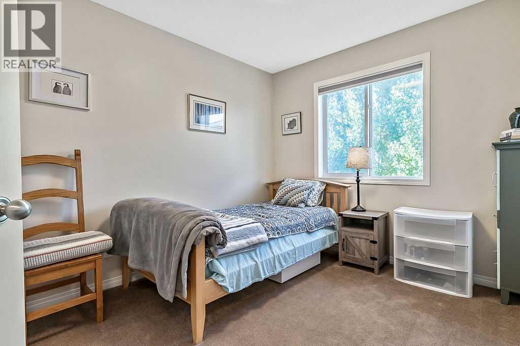 394 Cimarron Boulevard, Okotoks, Alberta  T1S 0A9 - Photo 19 - A2263407