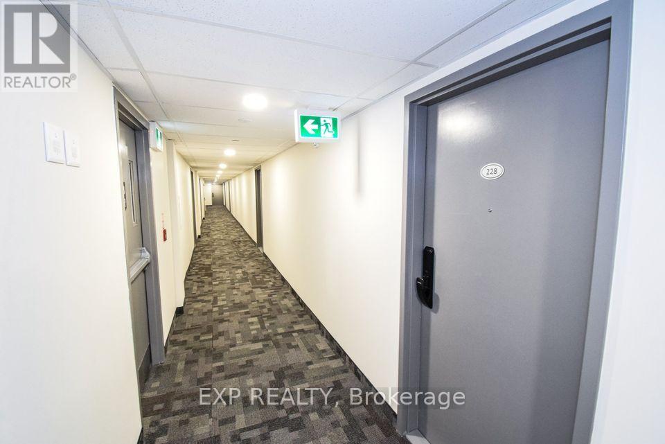 228 - 50 Herrick Avenue, St. Catharines, Ontario  L2P 0B8 - Photo 2 - X12492344