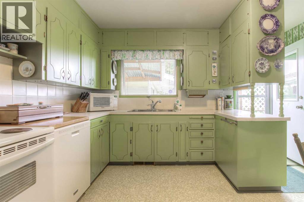 82 Wedgewood Drive Sw, Calgary, Alberta T3C 3G6 - Photo 13 - A2261667