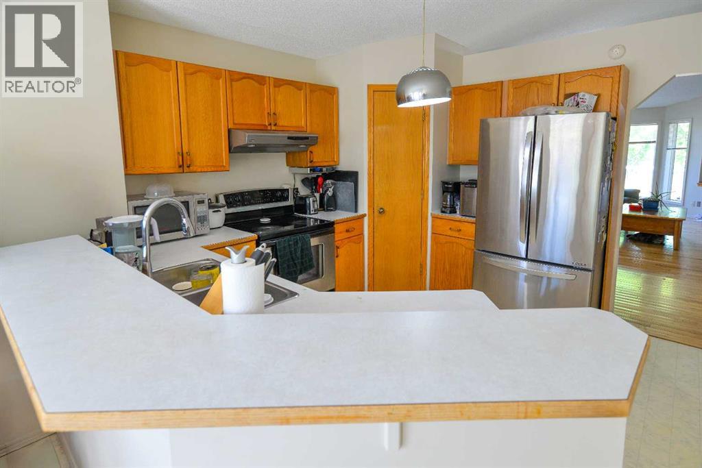 152 Valley Meadow Close Nw, Calgary, Alberta  T3B 5M2 - Photo 9 - A2264621