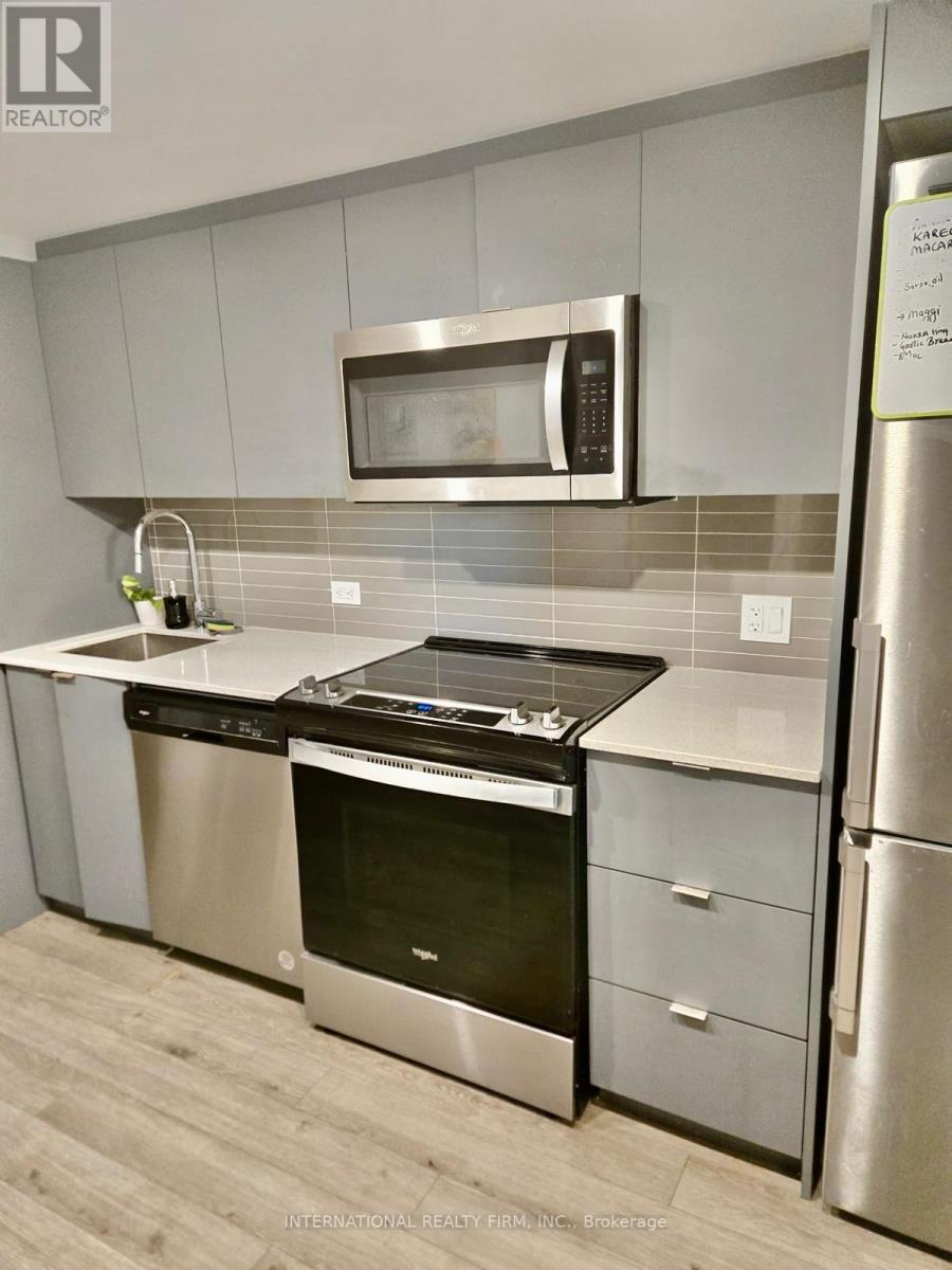 401 - 30 Tretti Way, Toronto, Ontario  M3H 0E3 - Photo 2 - C12492776