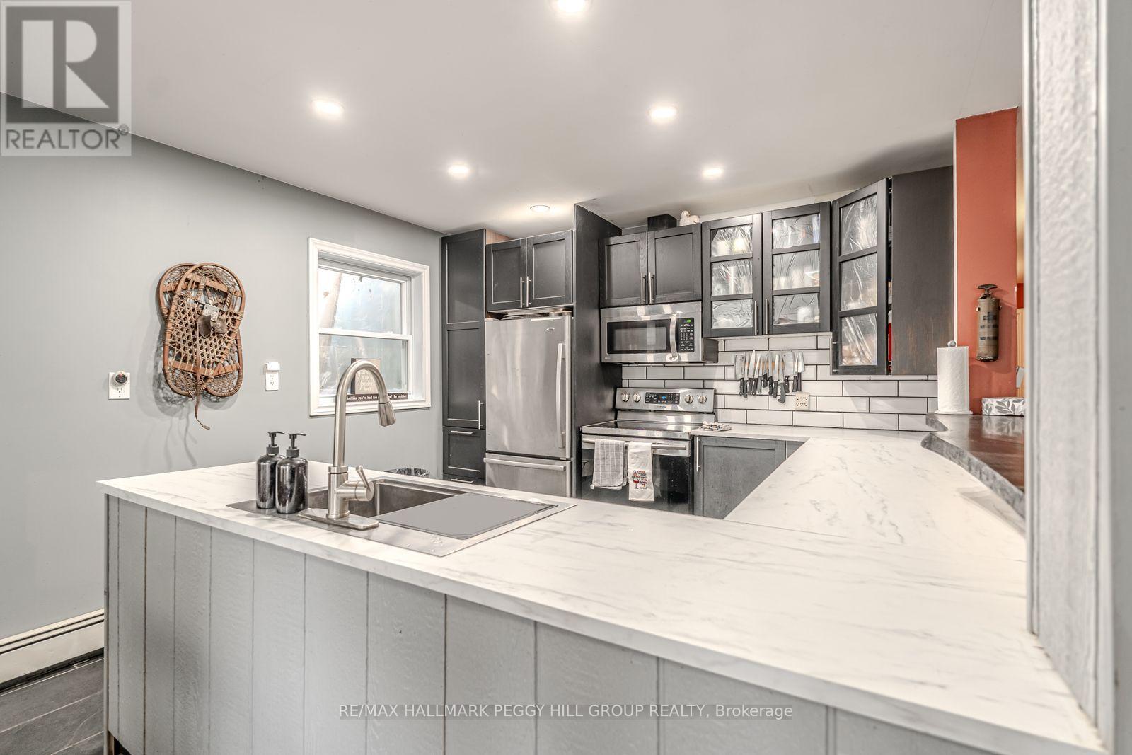 4 Clover Court, Kawartha Lakes, Ontario  K0M 2A0 - Photo 4 - X12383260