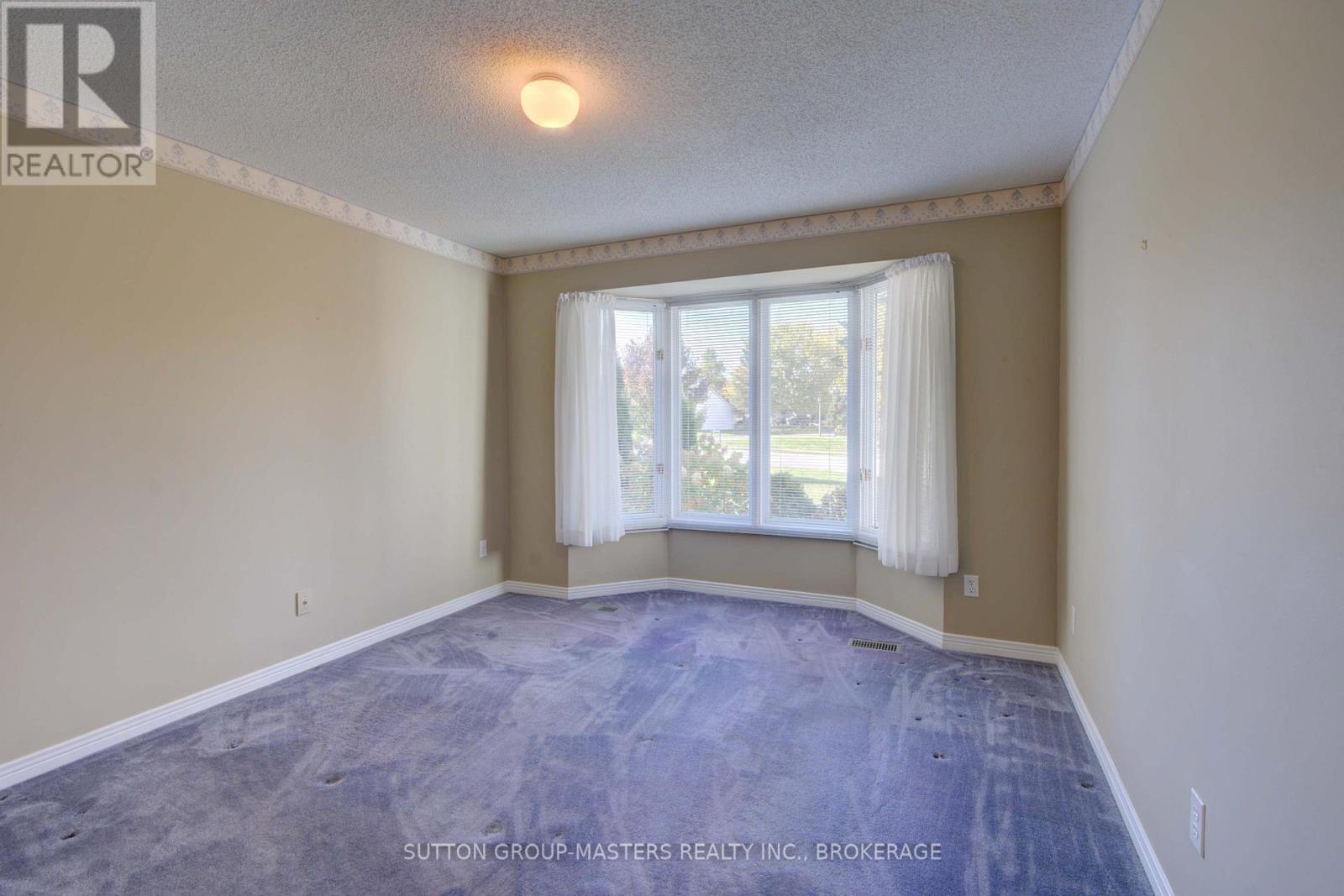 Country Cl - 17 Country Club Drive, Loyalist, Ontario  K0H 1G0 - Photo 16 - X12493126