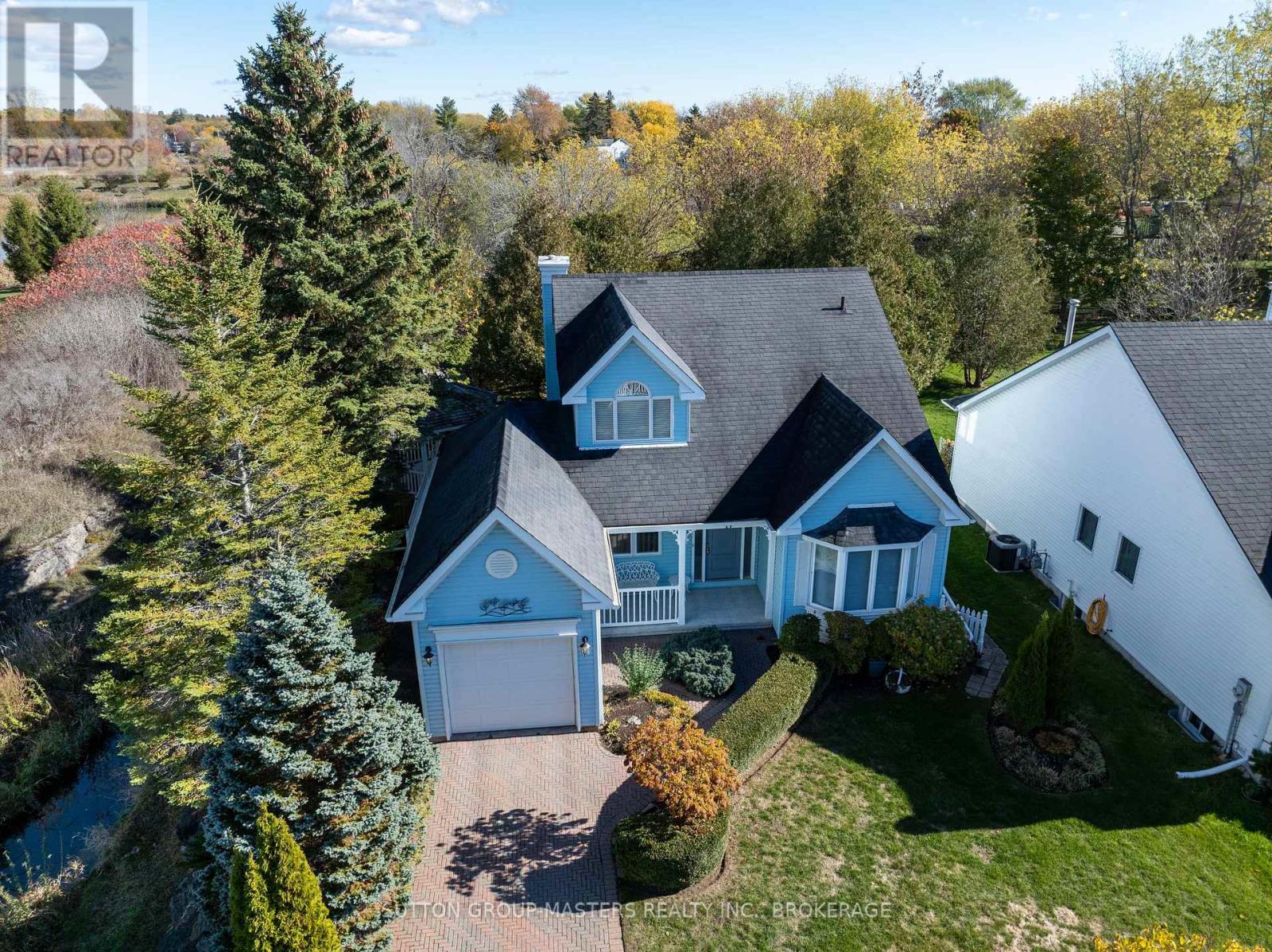 Country Cl - 17 Country Club Drive, Loyalist, Ontario  K0H 1G0 - Photo 2 - X12493126