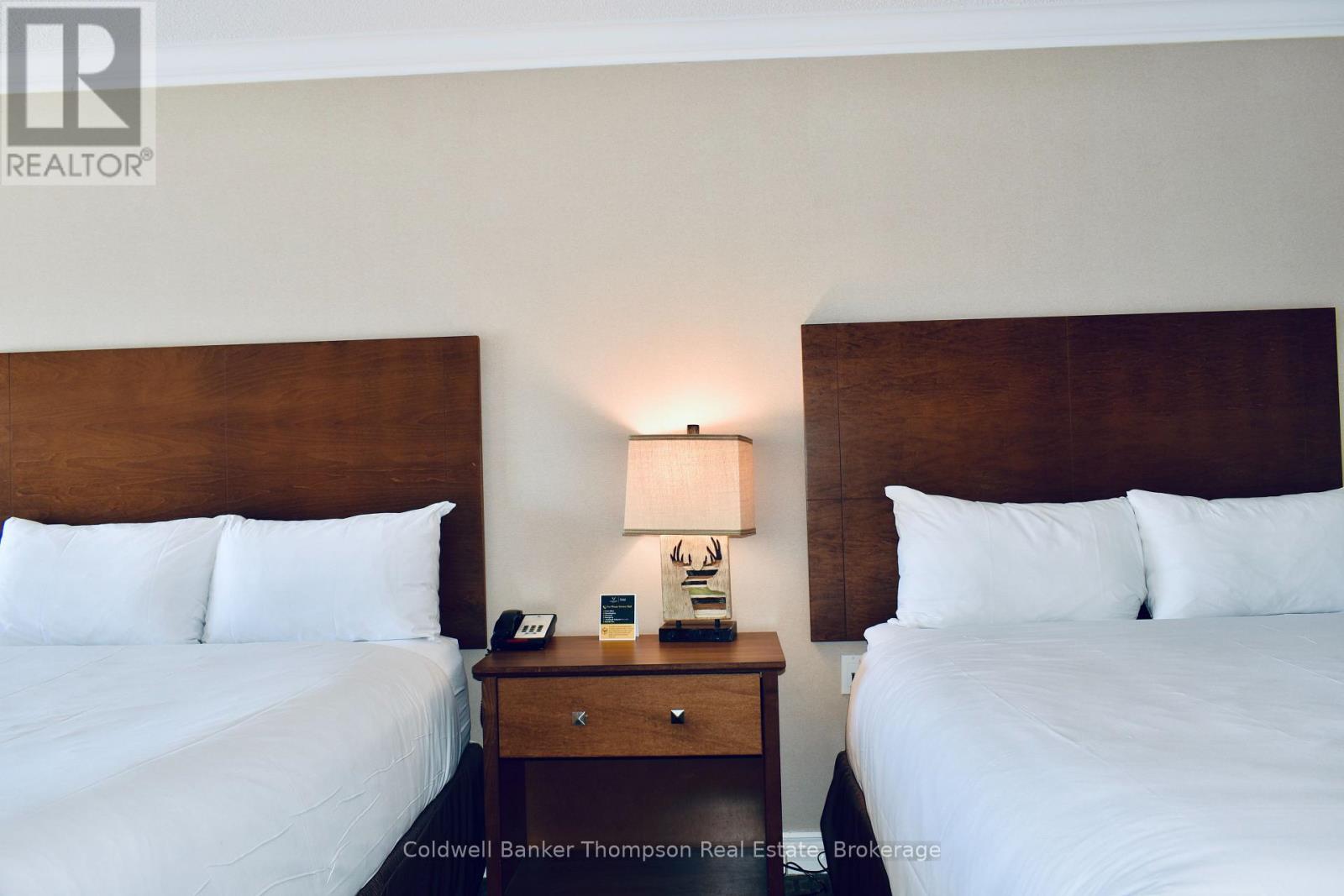 312 - 312 - Bayshore Deerhurst Drive, Huntsville, Ontario  P1H 1A9 - Photo 8 - X12493048