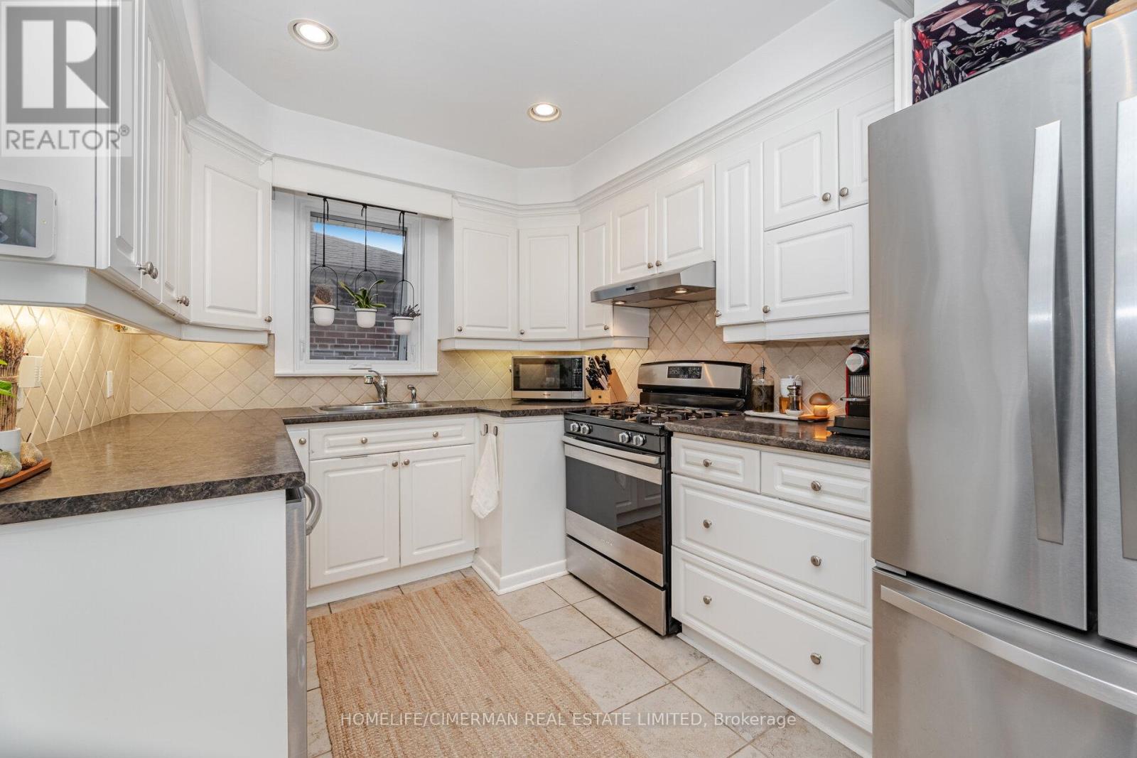 66 Mooreshead Drive, Toronto, Ontario  M9C 2S3 - Photo 12 - W12492936