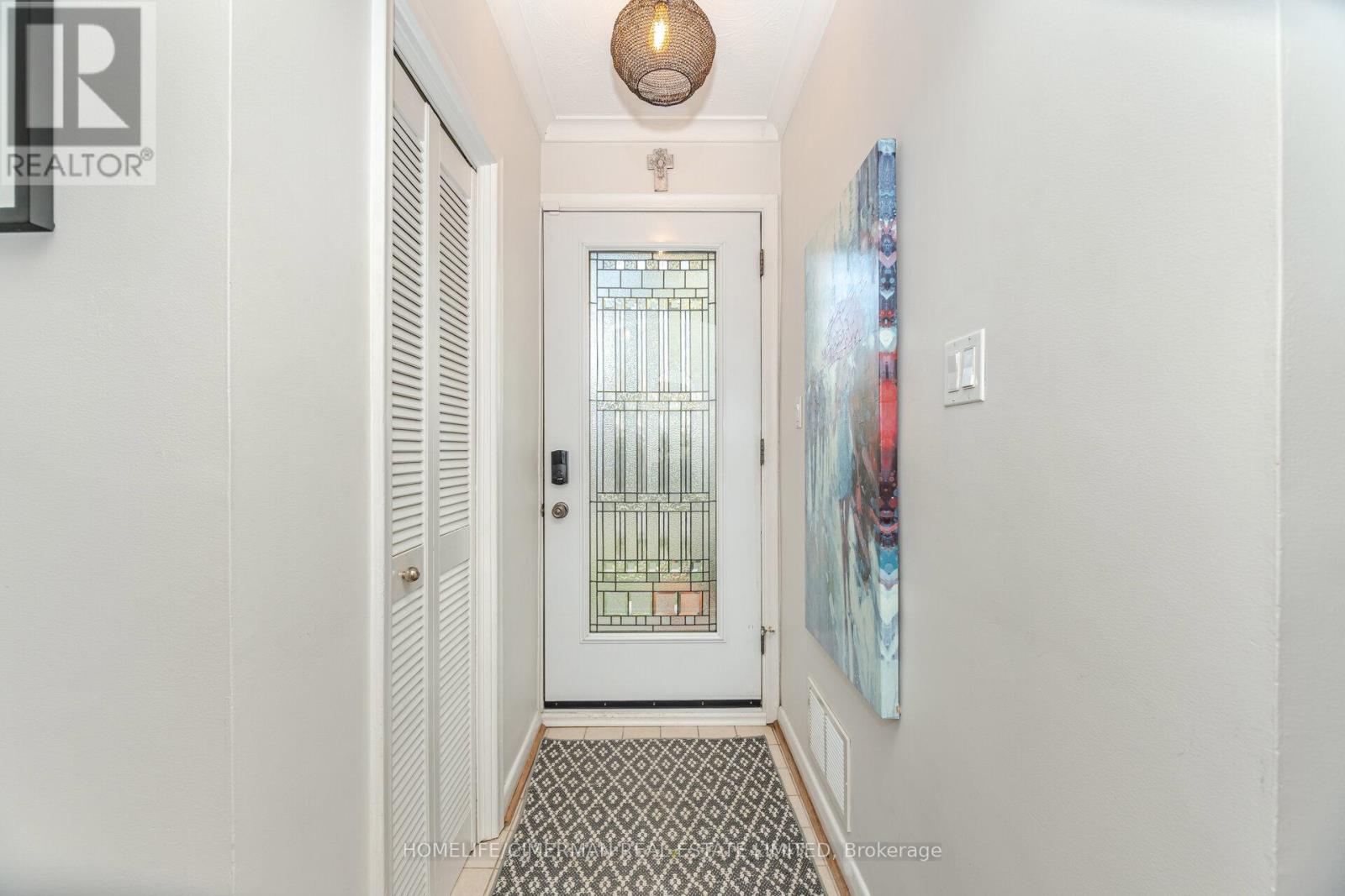 66 Mooreshead Drive, Toronto, Ontario  M9C 2S3 - Photo 6 - W12492936