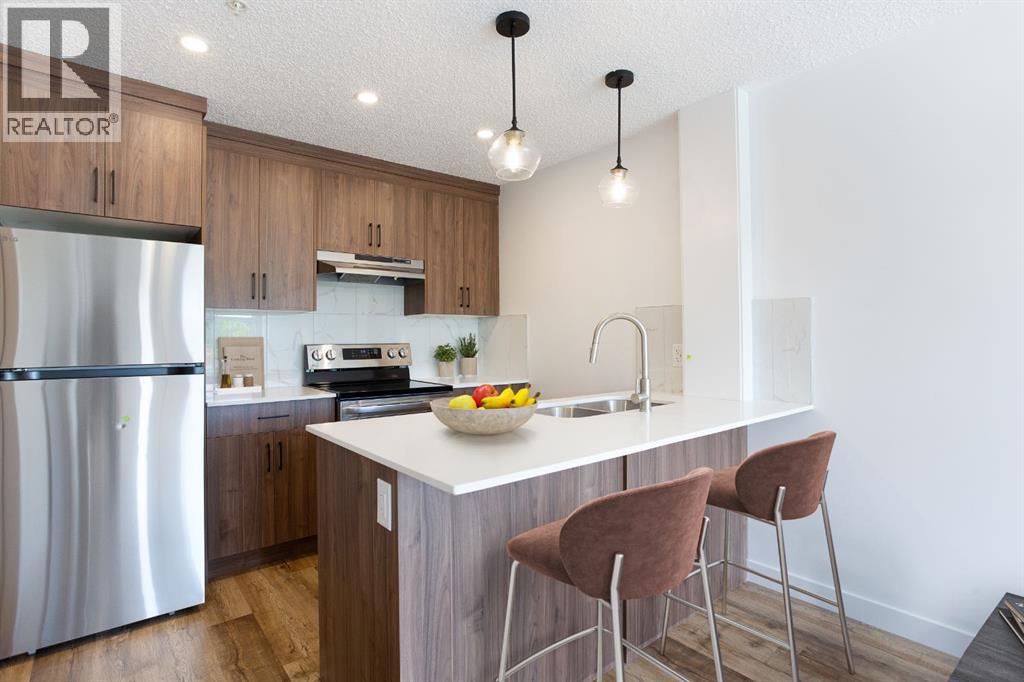 102, 156 Park Street, Cochrane, Alberta  T4C 2B8 - Photo 4 - A2259335