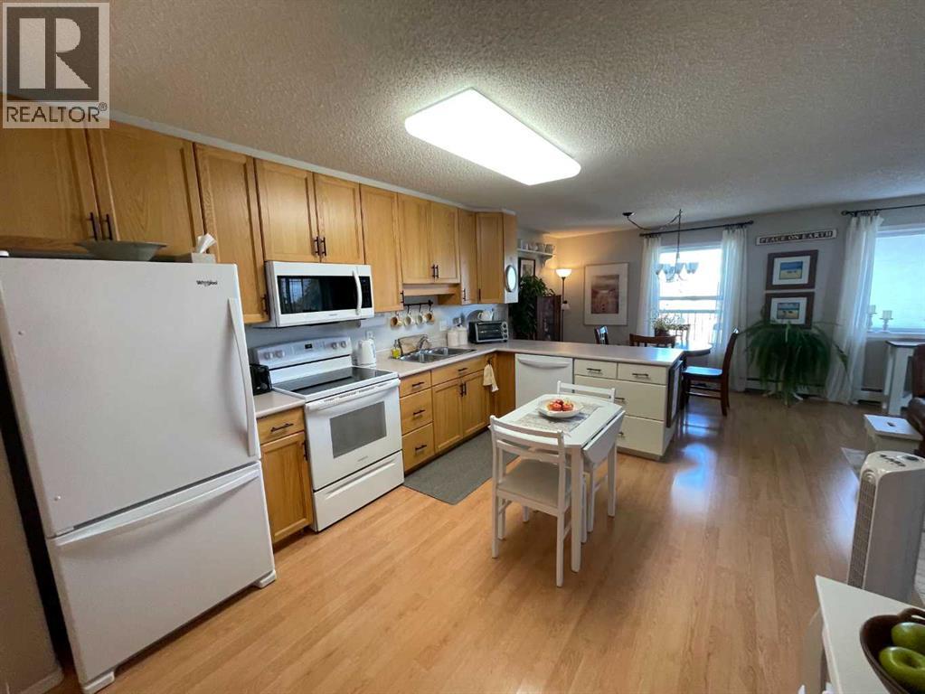 404, 1881 17 Street, Didsbury, Alberta  T0M 0W0 - Photo 4 - A2267256