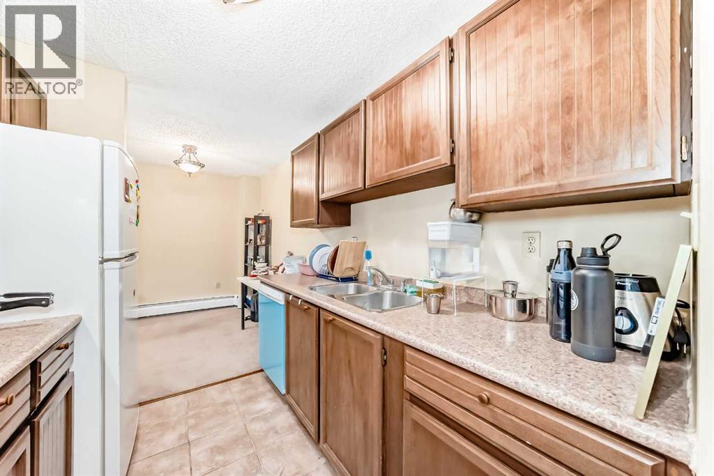 313, 816 89 Avenue Sw, Calgary, Alberta T2V 4N8 - Photo 13 - A2234829