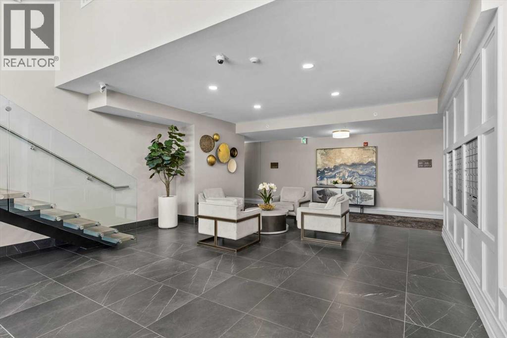 313, 15 Cougar Ridge Landing Sw, Calgary, Alberta  T3H 6C3 - Photo 7 - A2223439