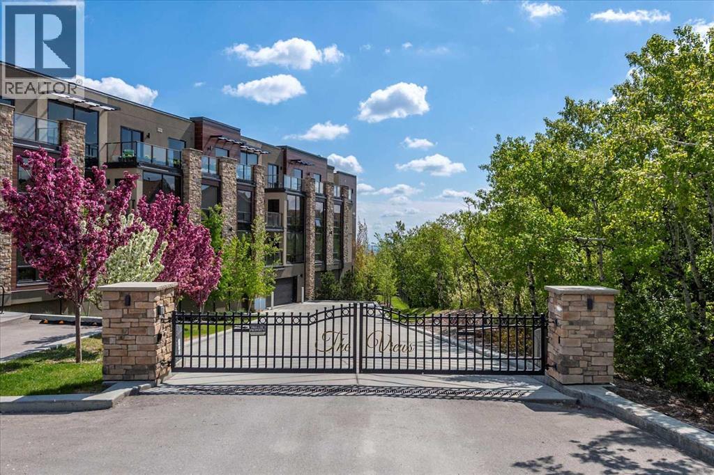 313, 15 Cougar Ridge Landing Sw, Calgary, Alberta  T3H 6C3 - Photo 4 - A2223439