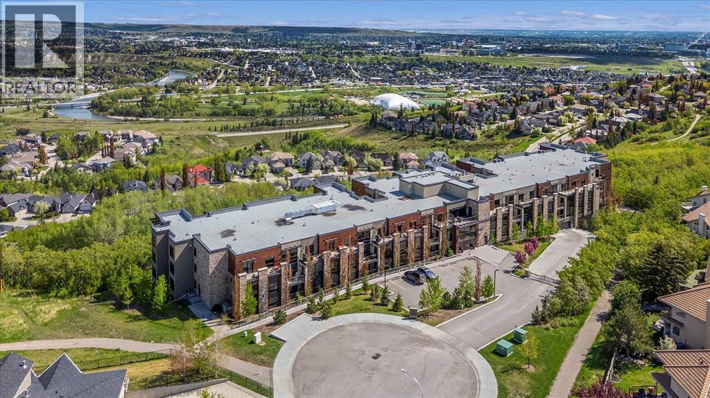 313, 15 Cougar Ridge Landing Sw, Calgary, Alberta  T3H 6C3 - Photo 3 - A2223439