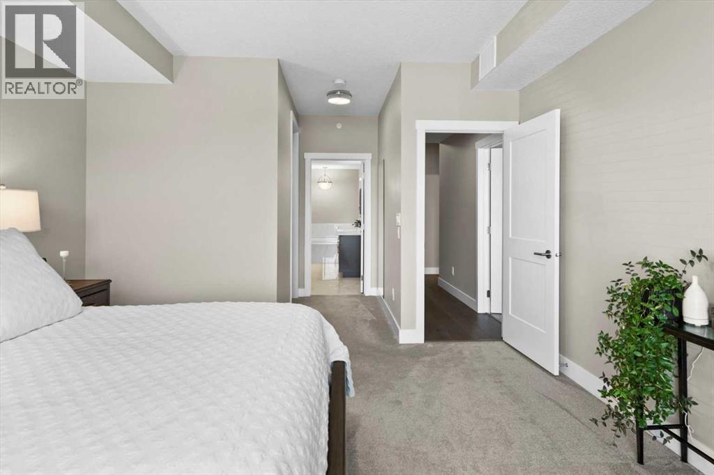313, 15 Cougar Ridge Landing Sw, Calgary, Alberta  T3H 6C3 - Photo 22 - A2223439