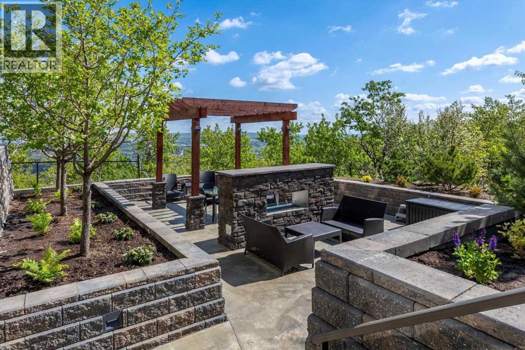 313, 15 Cougar Ridge Landing Sw, Calgary, Alberta  T3H 6C3 - Photo 38 - A2223439