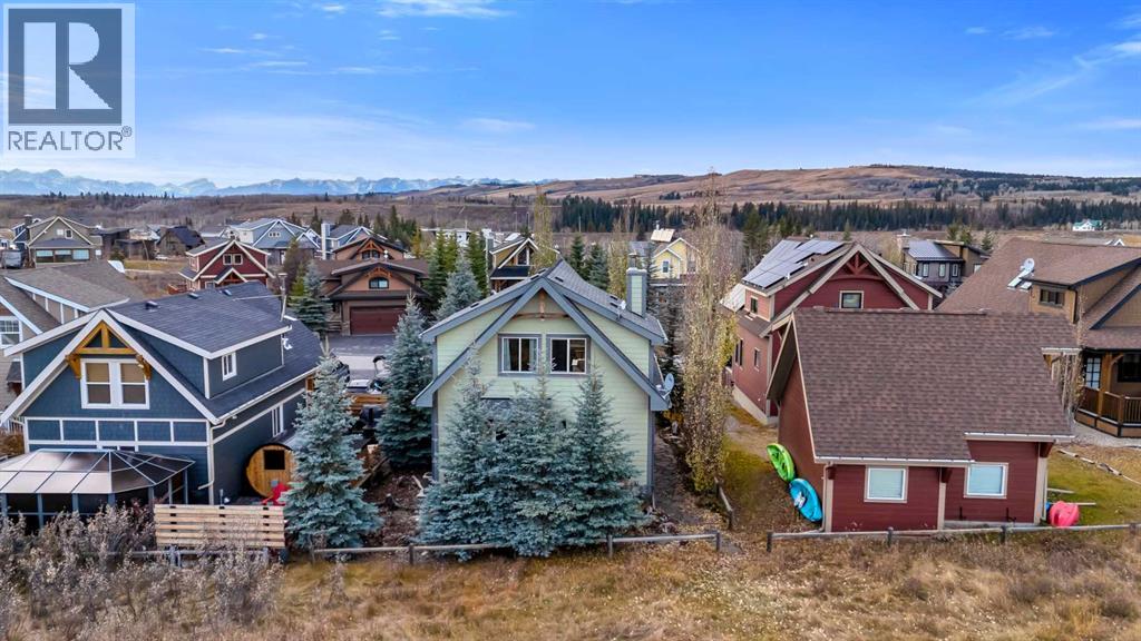 256 Cottageclub Crescent, Rural Rocky View County, Alberta  T4C 1B1 - Photo 4 - A2265981