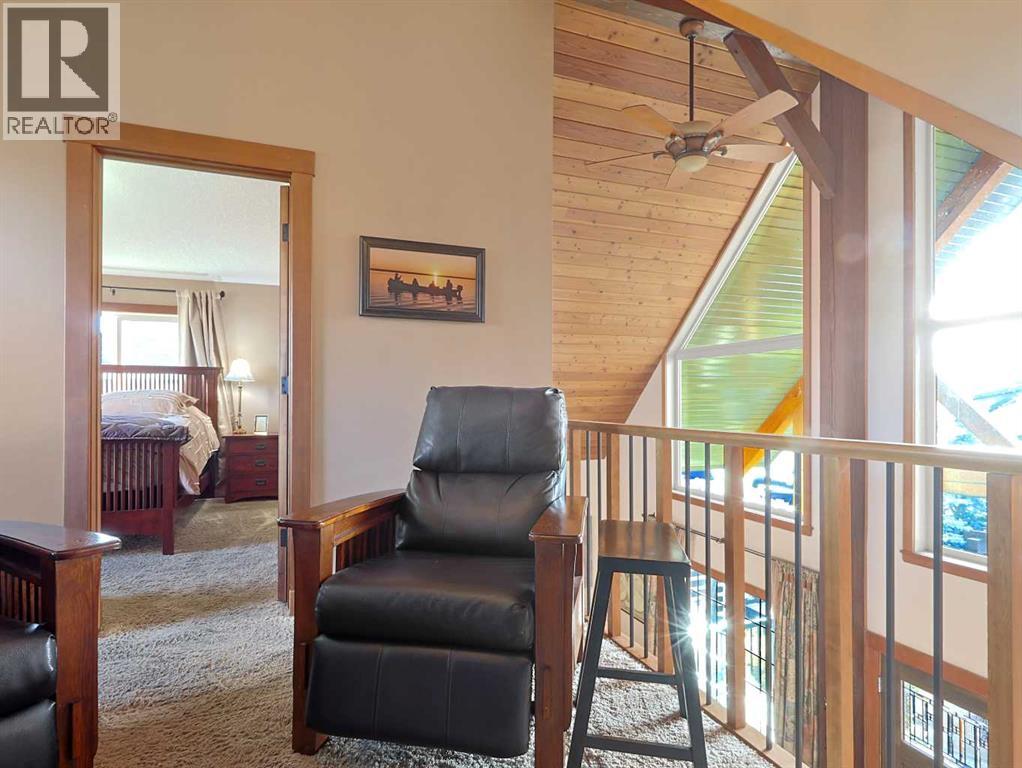 256 Cottageclub Crescent, Rural Rocky View County, Alberta  T4C 1B1 - Photo 19 - A2265981