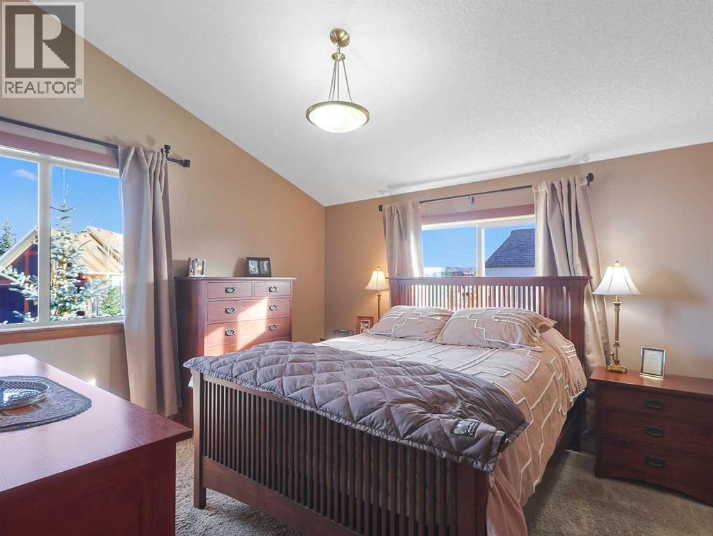 256 Cottageclub Crescent, Rural Rocky View County, Alberta  T4C 1B1 - Photo 15 - A2265981