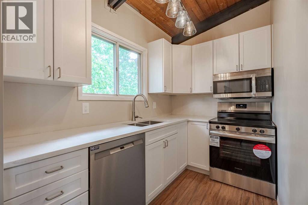 11016 5 Street Sw, Calgary, Alberta  T2W 1Y6 - Photo 6 - A2223643