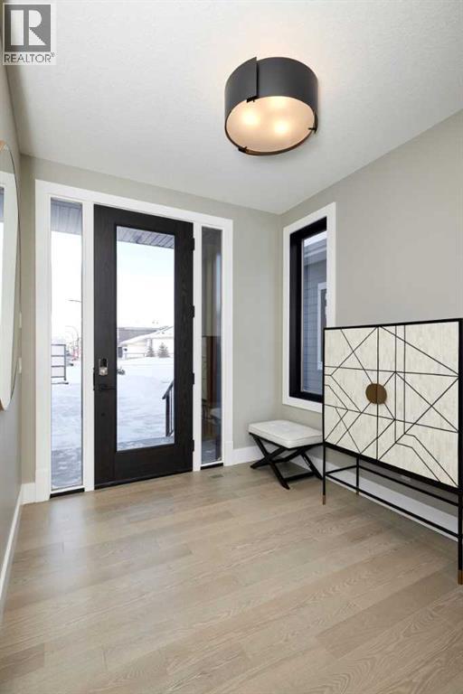 237 Rowmont Drive Nw, Calgary, Alberta  T3L 0L4 - Photo 5 - A2234596