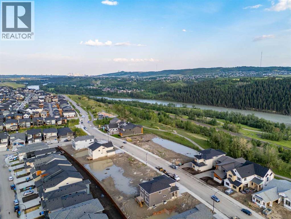 237 Rowmont Drive Nw, Calgary, Alberta  T3L 0L4 - Photo 3 - A2234596