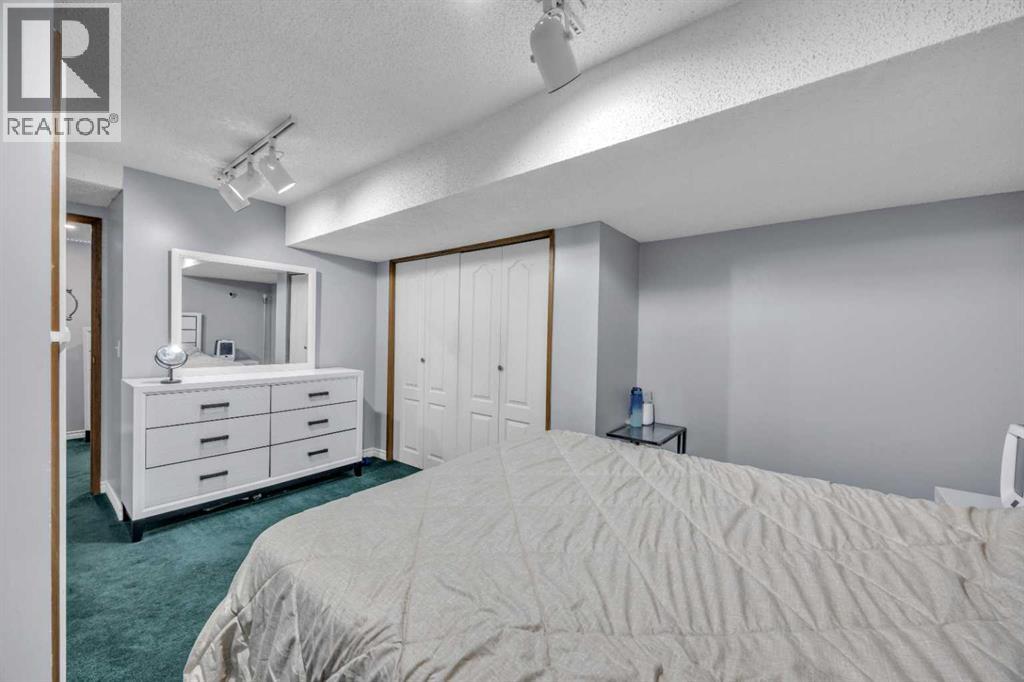 303 Ranchridge Bay Nw, Calgary, Alberta  T3G 1V5 - Photo 36 - A2265078