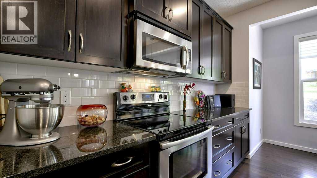 244 Heritage Bay, Cochrane, Alberta  T4C 0L3 - Photo 10 - A2235147