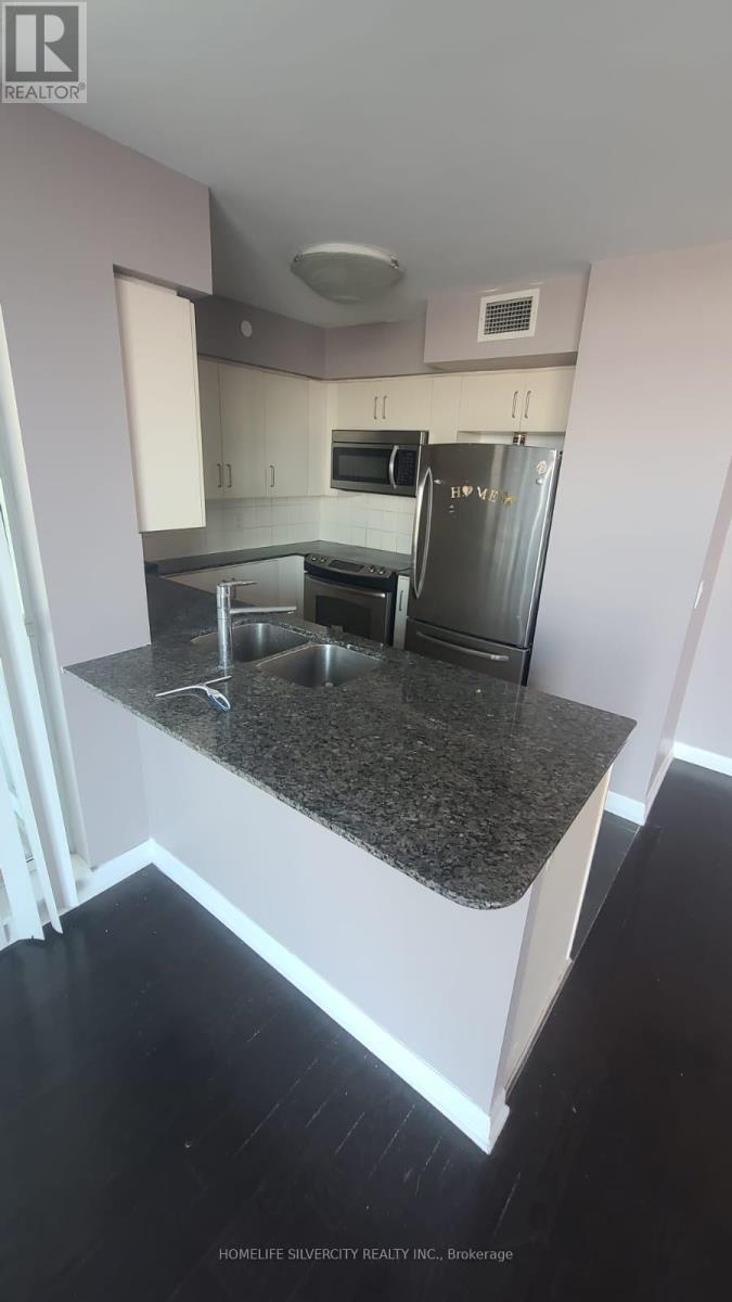 704 - 215 Sherway Gardens Road, Toronto, Ontario  M9C 0A4 - Photo 7 - W12494092