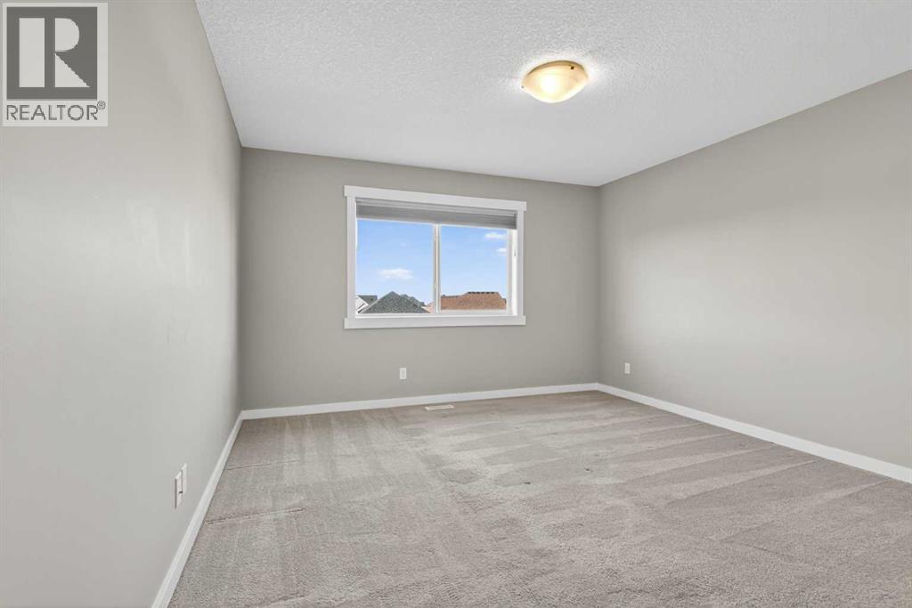 574 Sherwood Boulevard Nw, Calgary, Alberta  T3R 0R7 - Photo 25 - A2252427