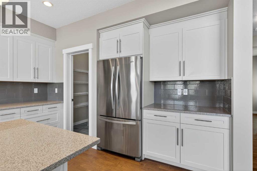 574 Sherwood Boulevard Nw, Calgary, Alberta  T3R 0R7 - Photo 9 - A2252427