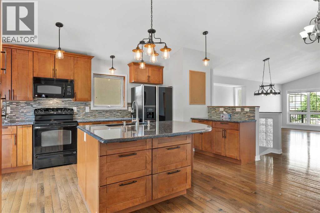 71 Arbour Wood Close Nw, Calgary, Alberta  T3G 4A8 - Photo 5 - A2240666