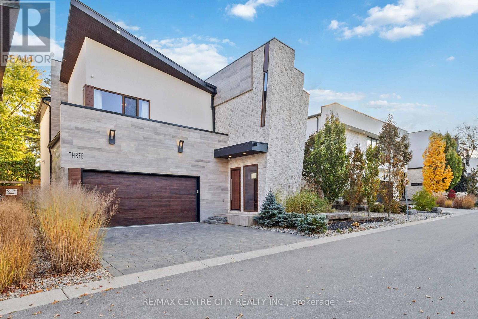 More than a home, this is a lifestyle. Welcome to the impressive and contemporary residence tucked away in Byron's prestigious Alcove development by Millstone. Close to 5000SF of finished space, 4+1 bedrooms and 5.5 bathrooms will allow you to live with comfort and class, offering a backdrop that will elevate the everyday. Stunning stone & stucco architecture, unique modern design & premium finishes showcase this stunning home with luxurious elements around every corner. Custom floating staircase offers an upscale first look, complemented by glass railing, stone accents & exceptional millwork to create a minimalist appearance. Hardwood flooring throughout, with designated formal dining, powder room & pantry.  A chef's kitchen is outfitted with built-in appliances, a gas range, dual dishwashers, and chic cabinetry with built-in storage. Adjacent, appreciate a spacious great room drenched in natural light by twin oversized patio sliders - an ideal space for a quiet night in or a dynamic evening of hosting a crowd. This overlooks an incredible exterior space ready for recreation and leisure. Discover a custom mudroom with built-in storage with access to double garage and heated driveway, and full bathroom with steam shower and patio door to the backyard grounds allowing optimal enjoyment of this space. The second level boasts four bedrooms, each with ensuite privileges. The primary includes stunning ensuite featuring top of the line fixtures, heated floors, and cutting edge design. Custom dressing room includes built-in cabinetry and storage. Lower level is finished with home gym, media room, bedroom, full bathroom and storage.  Discover an entertainer's delight in the private yard, complete with inground saltwater pool with automated cover, hot tub, sitting area & concrete patio. Just minutes to Boler mountain, and tucked away in one of London's favourite neighbourhoods, you'll crave every corner of this showpiece - come see it to appreciate it. (id:48254)