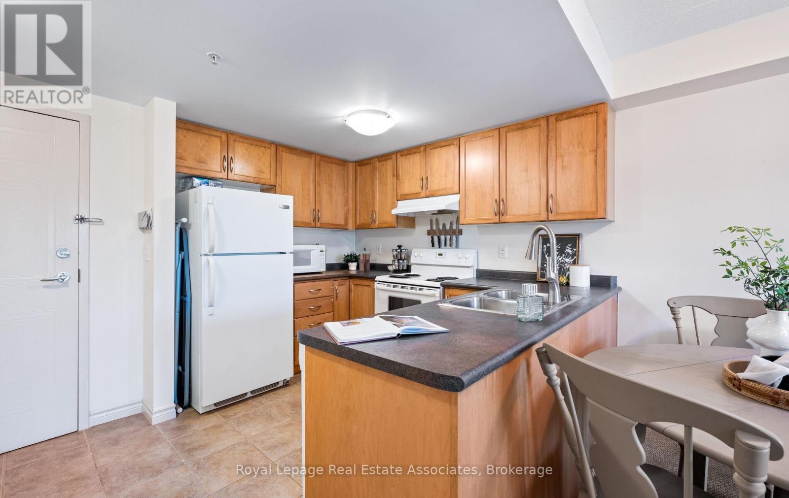 105 - 45 Goodwin Drive, Guelph, Ontario  N1L 0E9 - Photo 6 - X12494286