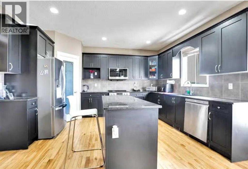 1065 Channelside Drive Sw, Airdrie, Alberta  t4b 3k4 - Photo 8 - A2267313