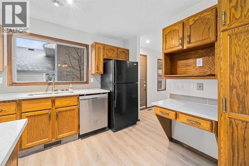 211 Sandstone Drive Nw, Calgary, Alberta  T3K 3C4 - Photo 12 - A2174813