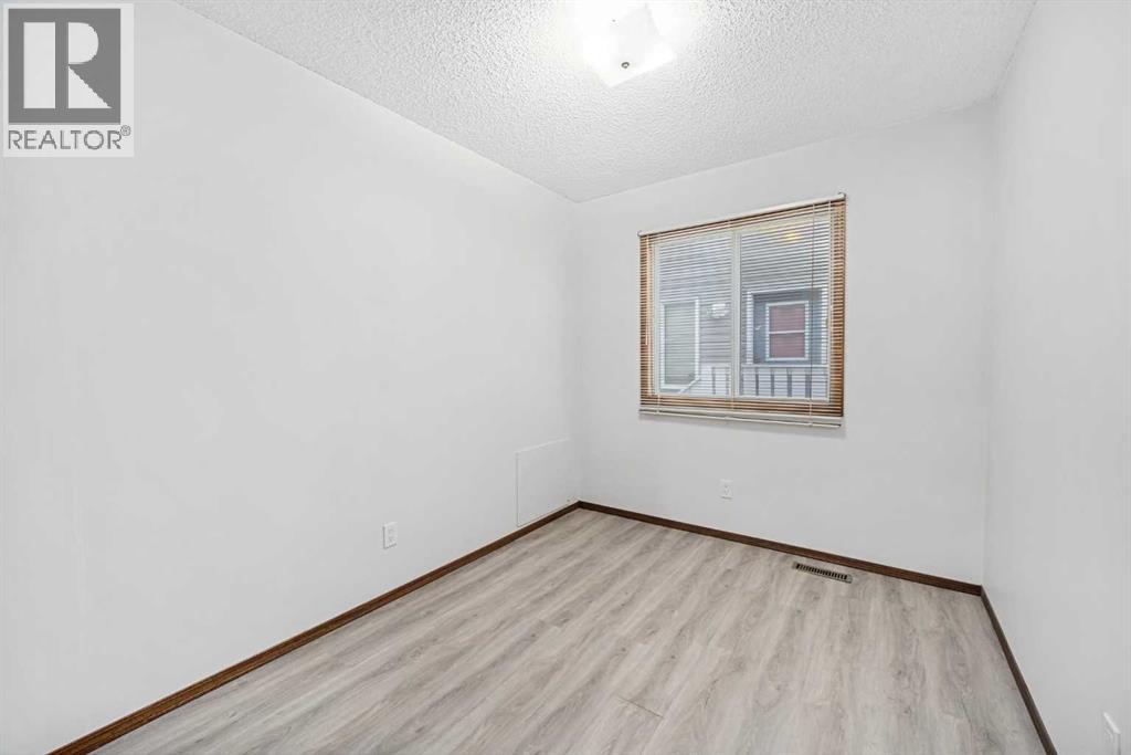 211 Sandstone Drive Nw, Calgary, Alberta  T3K 3C4 - Photo 16 - A2174813