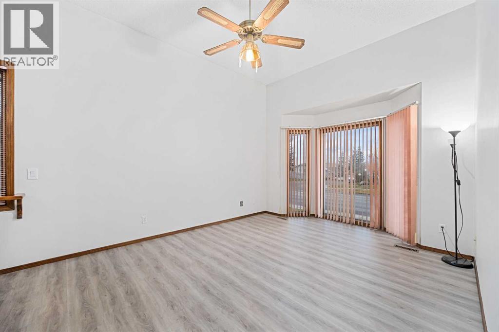 211 Sandstone Drive Nw, Calgary, Alberta  T3K 3C4 - Photo 6 - A2174813