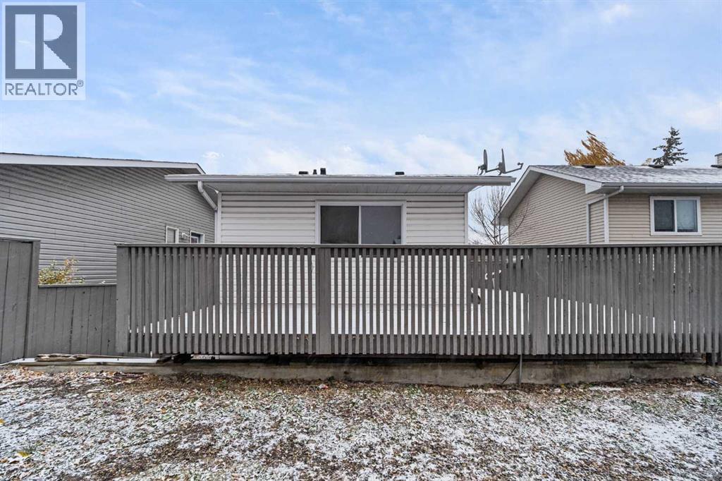 211 Sandstone Drive Nw, Calgary, Alberta  T3K 3C4 - Photo 5 - A2174813