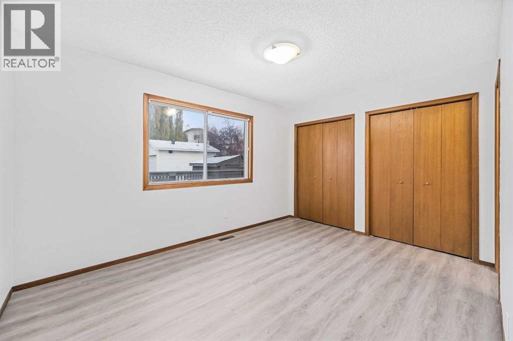 211 Sandstone Drive Nw, Calgary, Alberta  T3K 3C4 - Photo 18 - A2174813