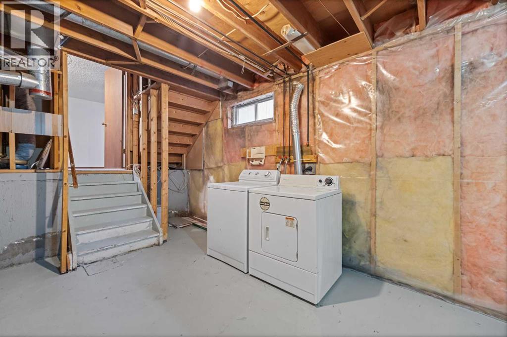 211 Sandstone Drive Nw, Calgary, Alberta  T3K 3C4 - Photo 28 - A2174813