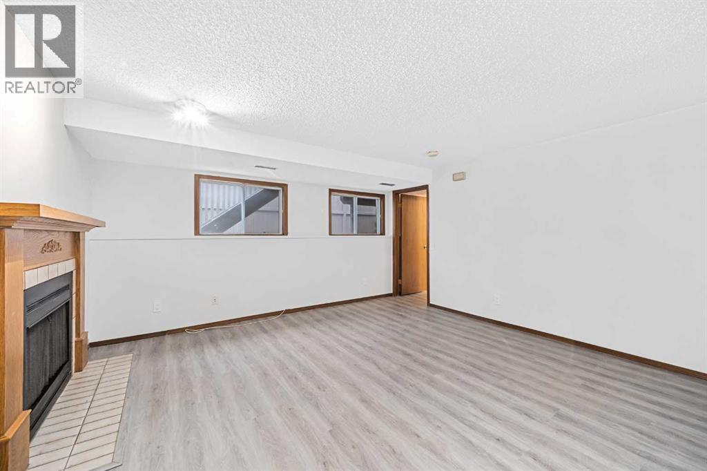 211 Sandstone Drive Nw, Calgary, Alberta  T3K 3C4 - Photo 22 - A2174813