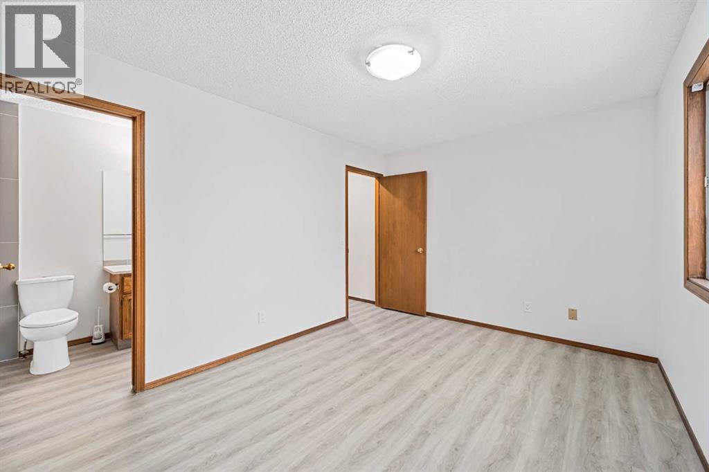 211 Sandstone Drive Nw, Calgary, Alberta  T3K 3C4 - Photo 20 - A2174813