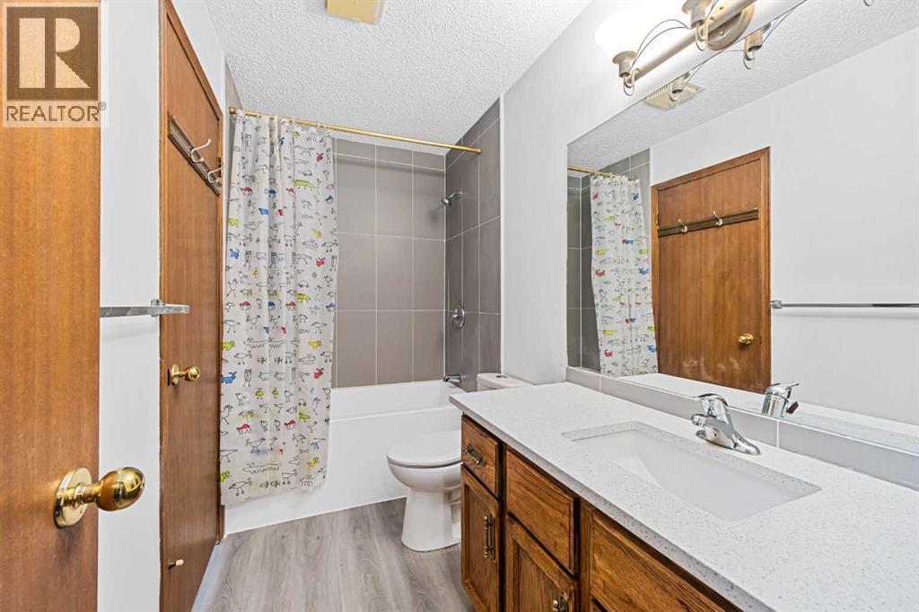 211 Sandstone Drive Nw, Calgary, Alberta  T3K 3C4 - Photo 21 - A2174813