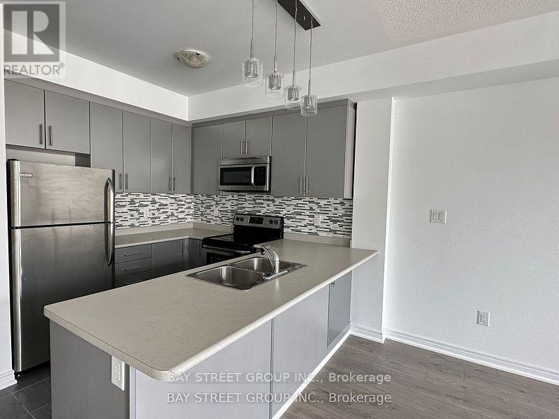 305 - 2333 Sawgrass Drive, Oakville, Ontario  L6H 0L2 - Photo 2 - W12494370