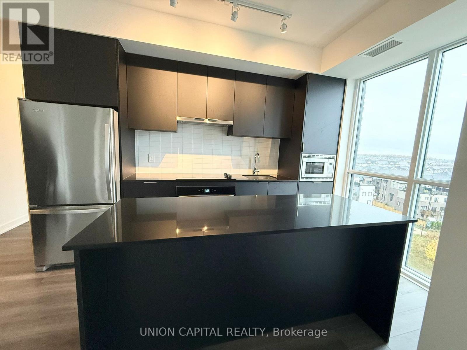 704 - 3071 Trafalgar Road, Oakville, Ontario  L6H 8C6 - Photo 2 - W12494416