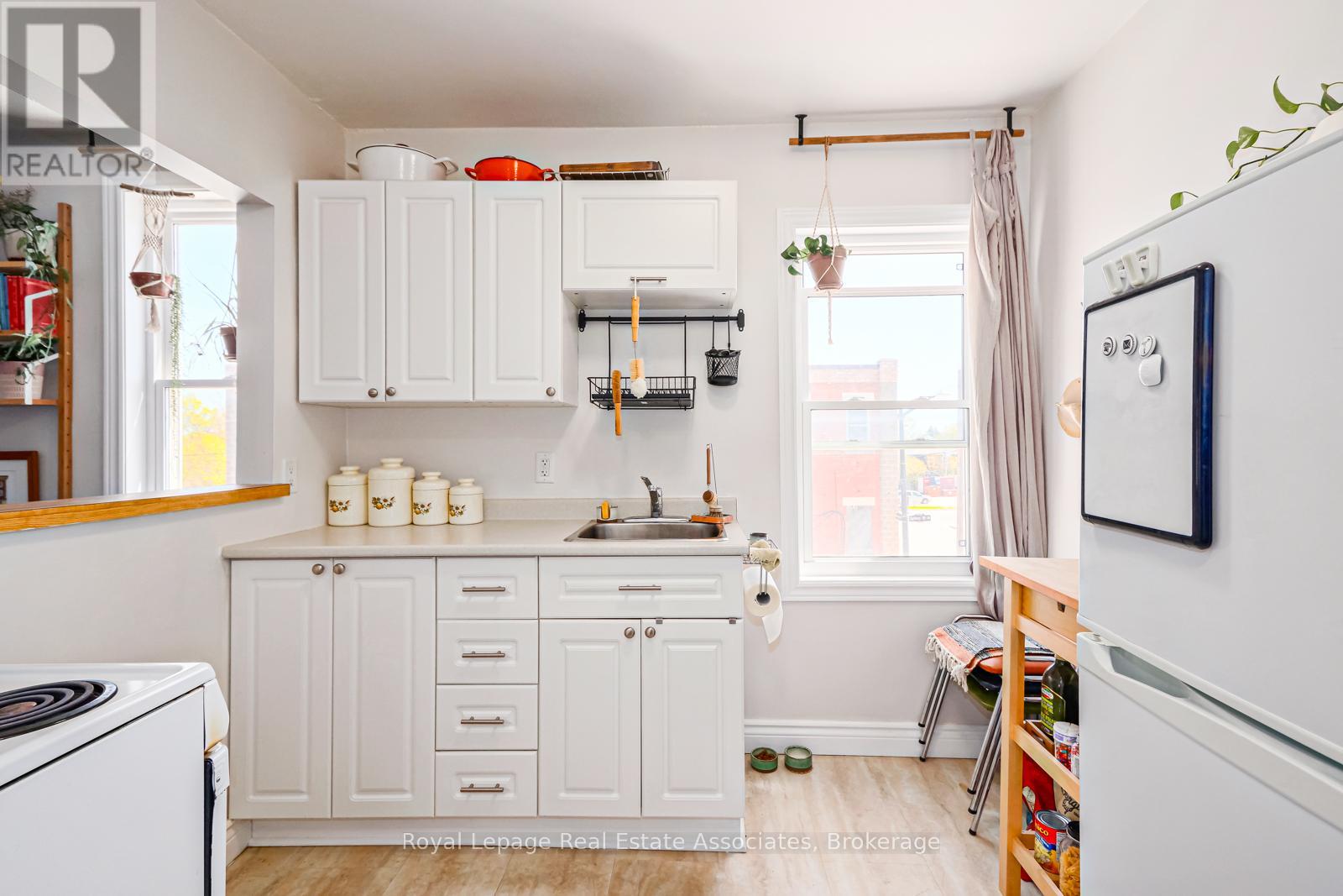 202 - 110 Sykes Street N, Meaford, Ontario  N4L 1S6 - Photo 2 - X12494606