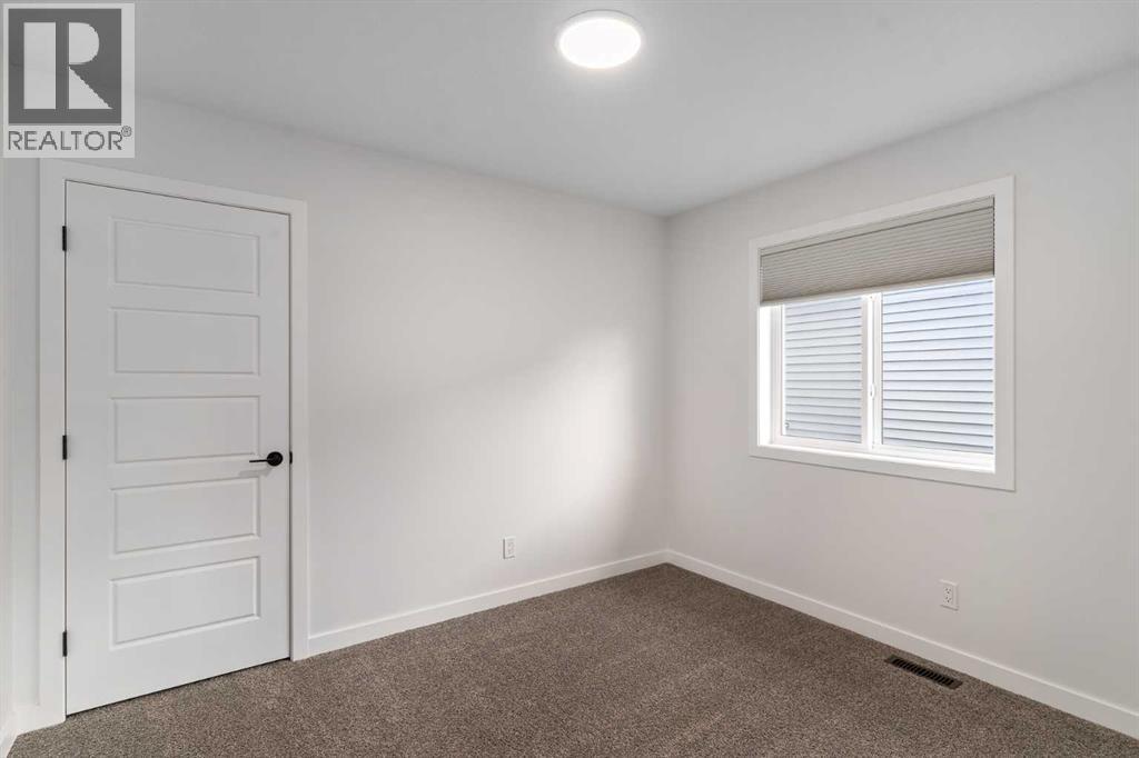 800 Reynolds Manor Sw, Airdrie, Alberta  T4B 5G2 - Photo 32 - A2267864